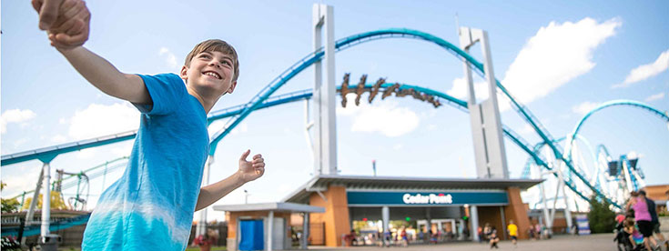 Boy leading parent to Cedar Point Boy leading parent to Cedar Point